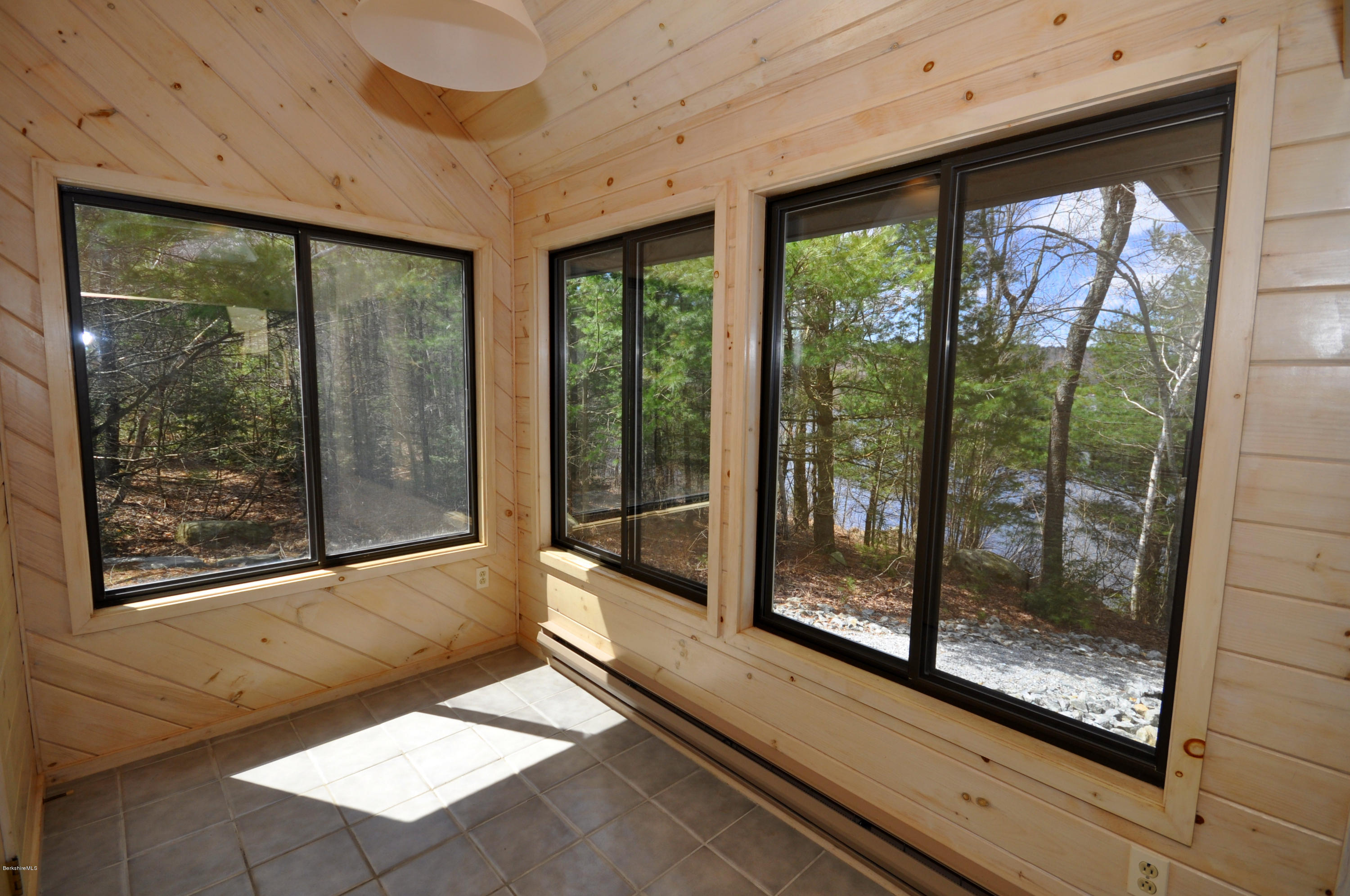 62 Algerie Road Becket, MA 01223 - Photo 10 of 29 a view of a room with a large window