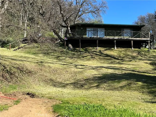 a view of house with ocean view
