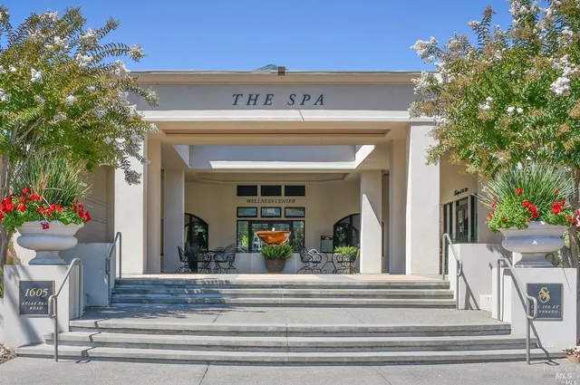 a view of a cafe with sitting area