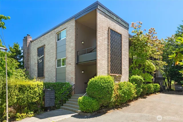 a front view of house and yard with green space