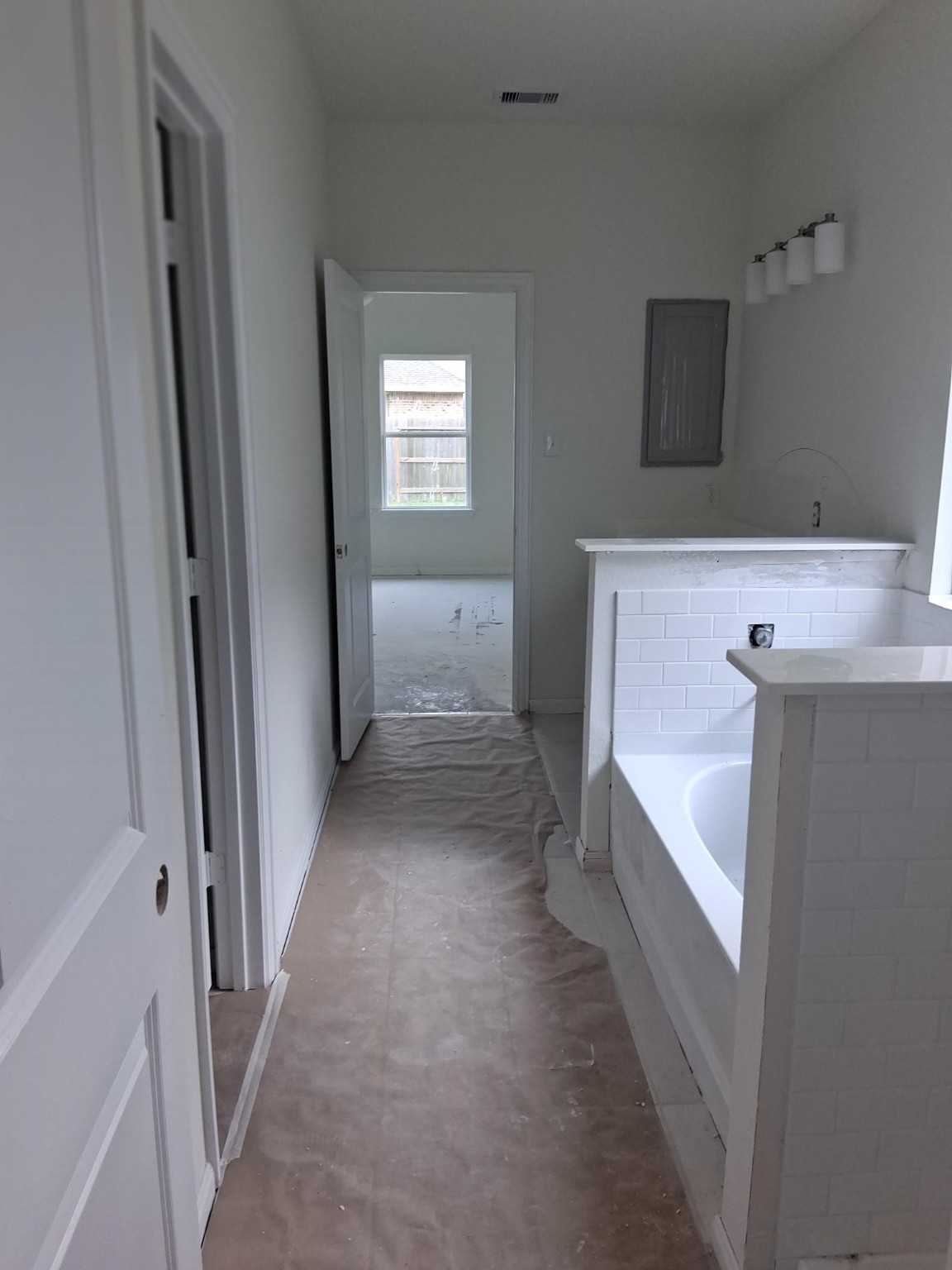 3603 Crosspointe Pass Angleton, TX 77515 - Photo 12 of 13 a view of a hallway with windows