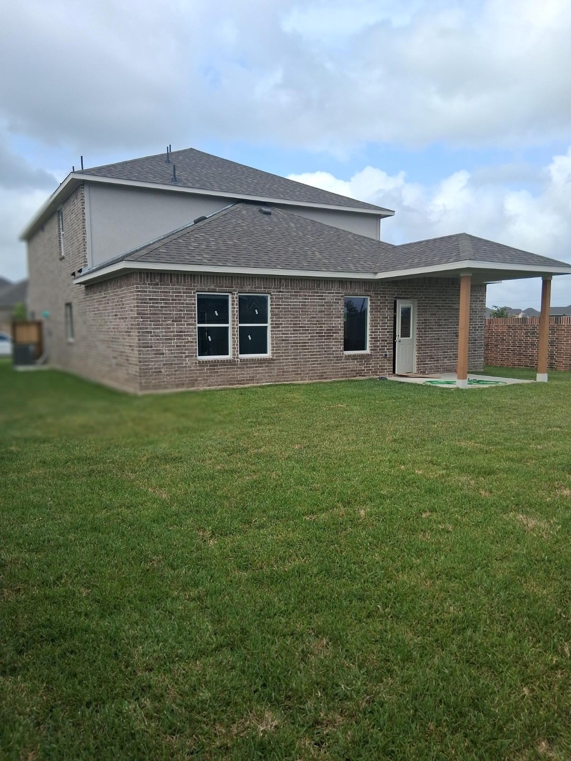 3603 Crosspointe Pass Angleton, TX 77515 - Photo 13 of 13 a front view of a house with a yard