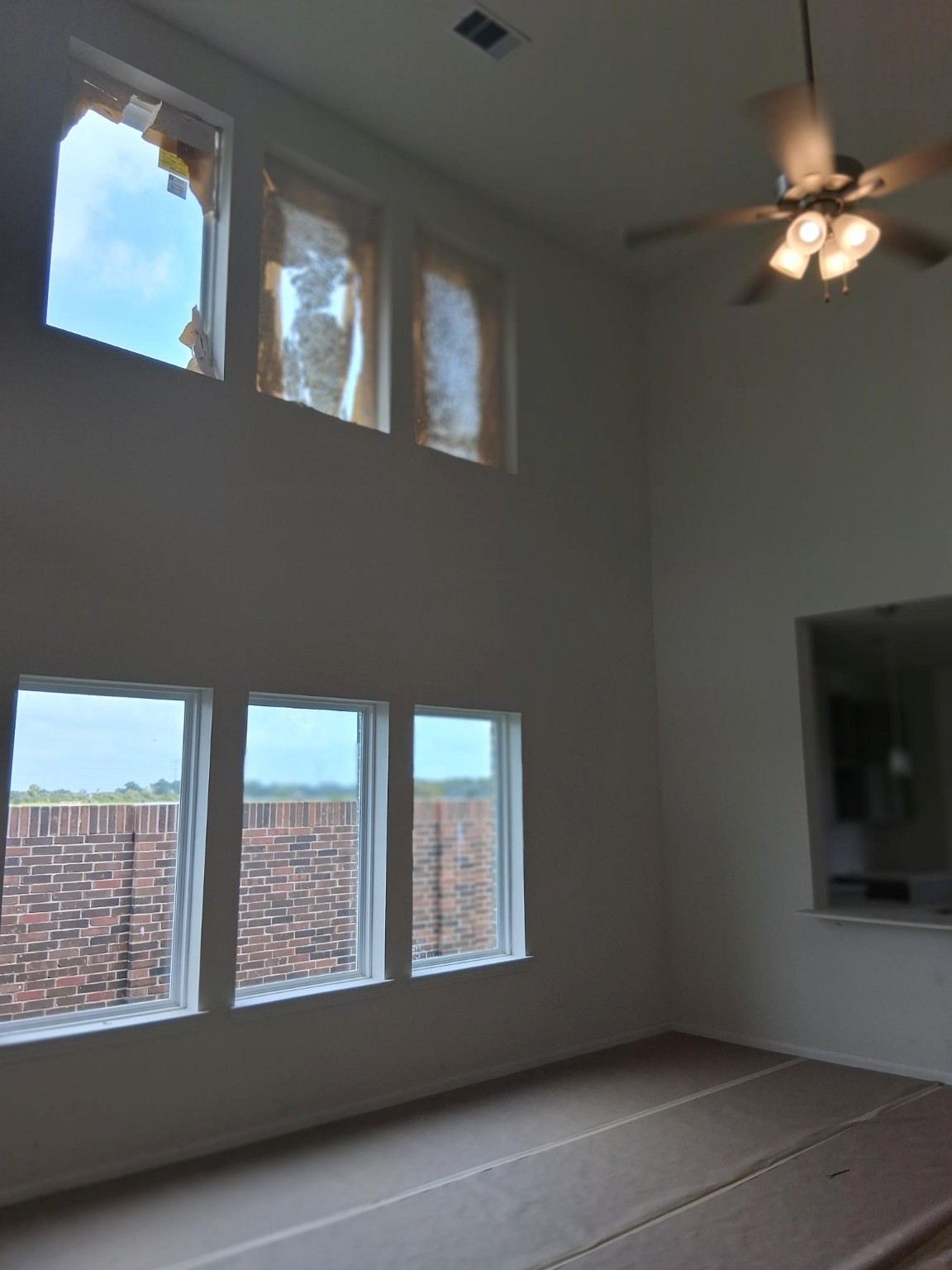 3603 Crosspointe Pass Angleton, TX 77515 - Photo 4 of 13 a view of an empty room with a window