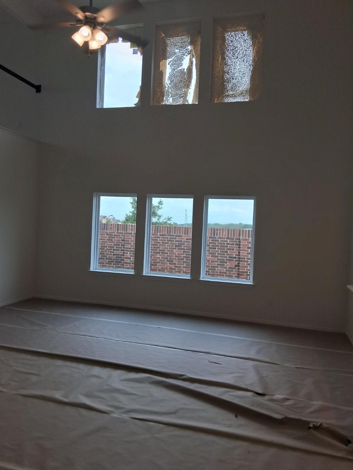 3603 Crosspointe Pass Angleton, TX 77515 - Photo 5 of 13 a view of an empty room with a window