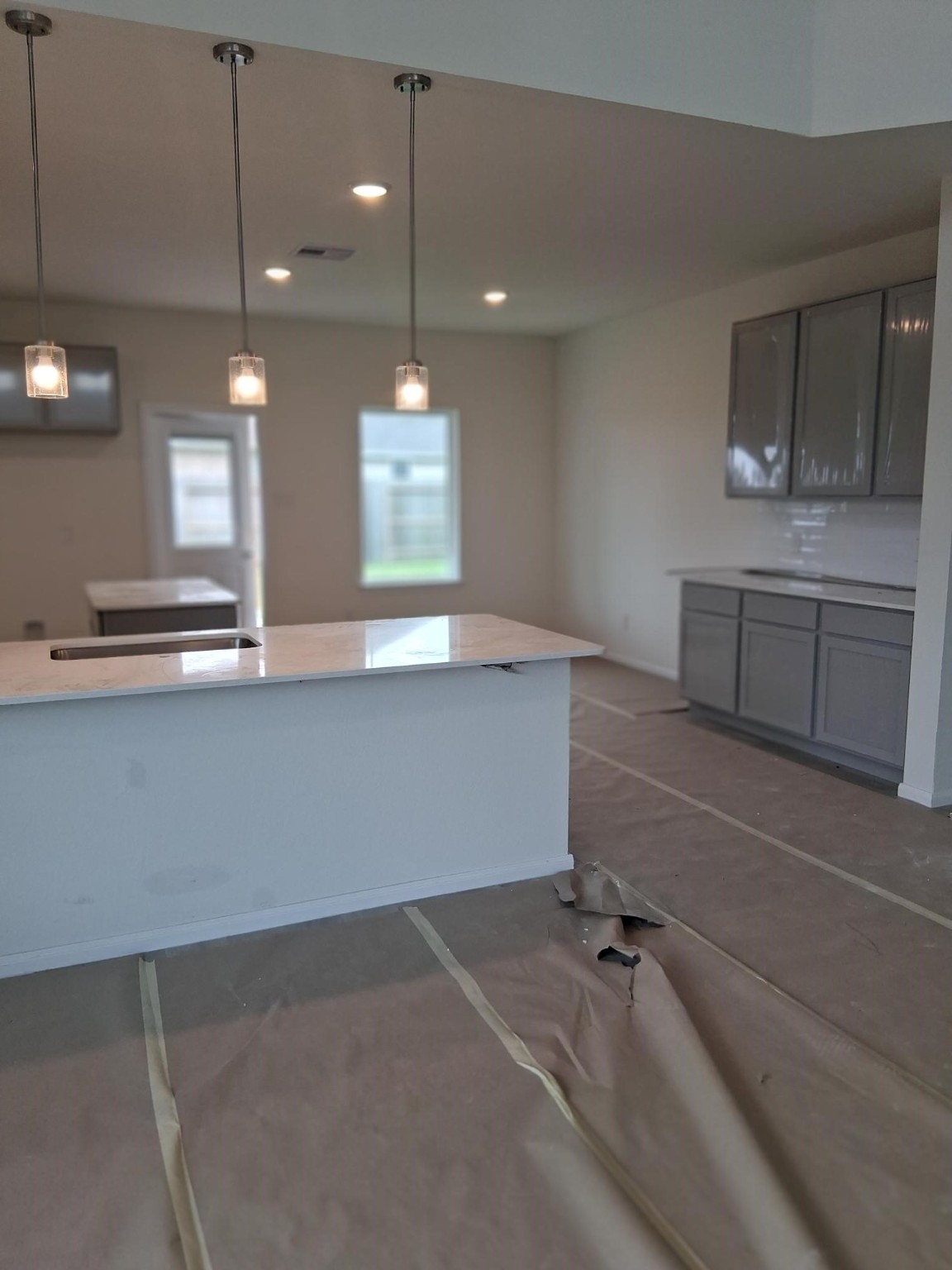 3603 Crosspointe Pass Angleton, TX 77515 - Photo 7 of 13 a view of a kitchen with a sink and window