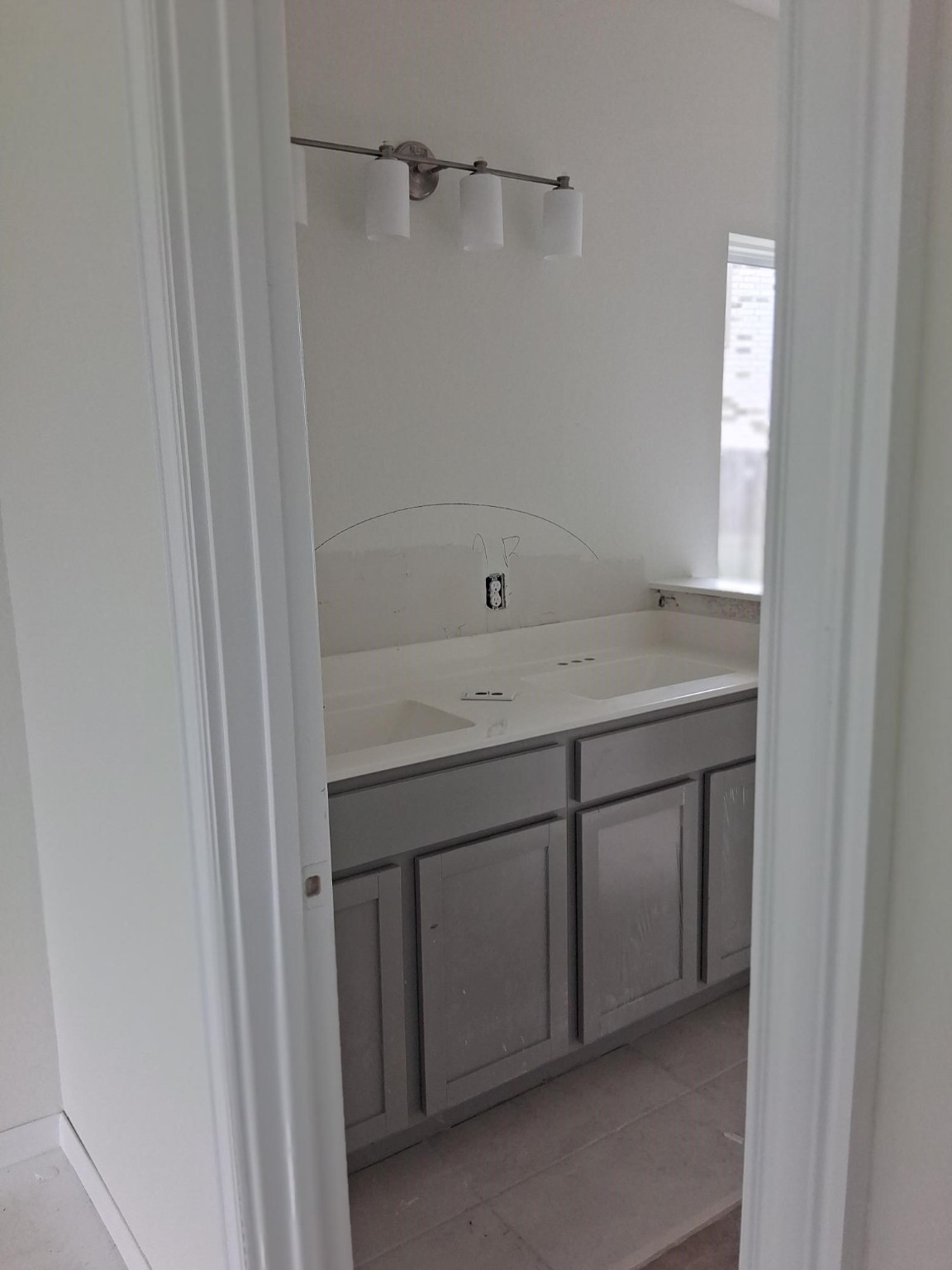 3603 Crosspointe Pass Angleton, TX 77515 - Photo 10 of 13 a bathroom with a sink vanity and a mirror