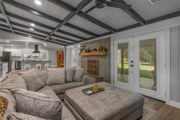 a living room with furniture and a table