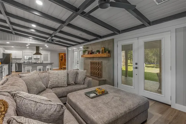 a living room with furniture and a table