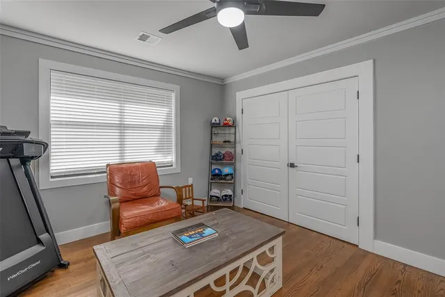 a kitchen with a sink a stove and cabinets