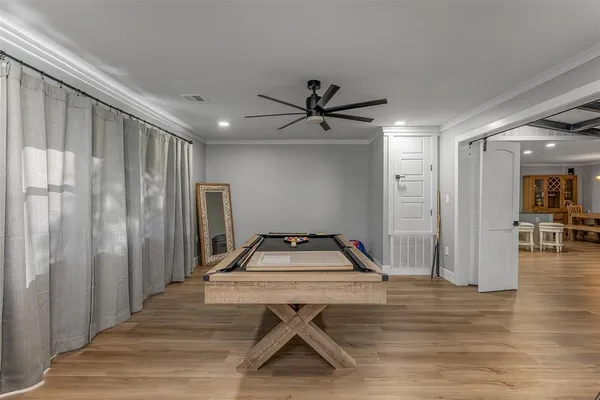 a room with furniture and a chandelier
