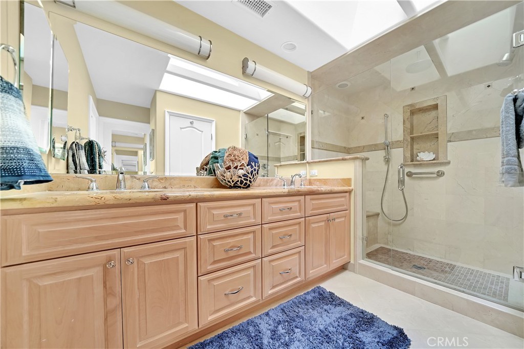 33631 Marlinspike Drive Dana Point, CA 92629 - Photo 20 of 39 a bathroom with a granite countertop sink mirror and
