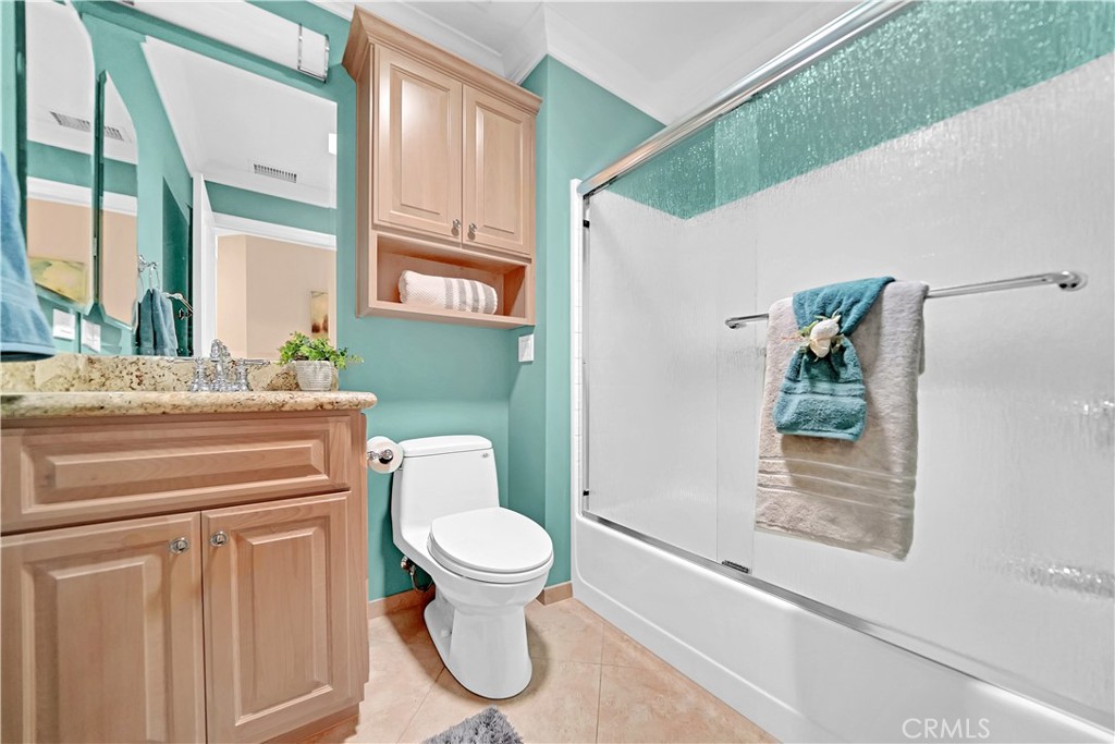 33631 Marlinspike Drive Dana Point, CA 92629 - Photo 27 of 39 a bathroom with a granite countertop toilet sink and mirror