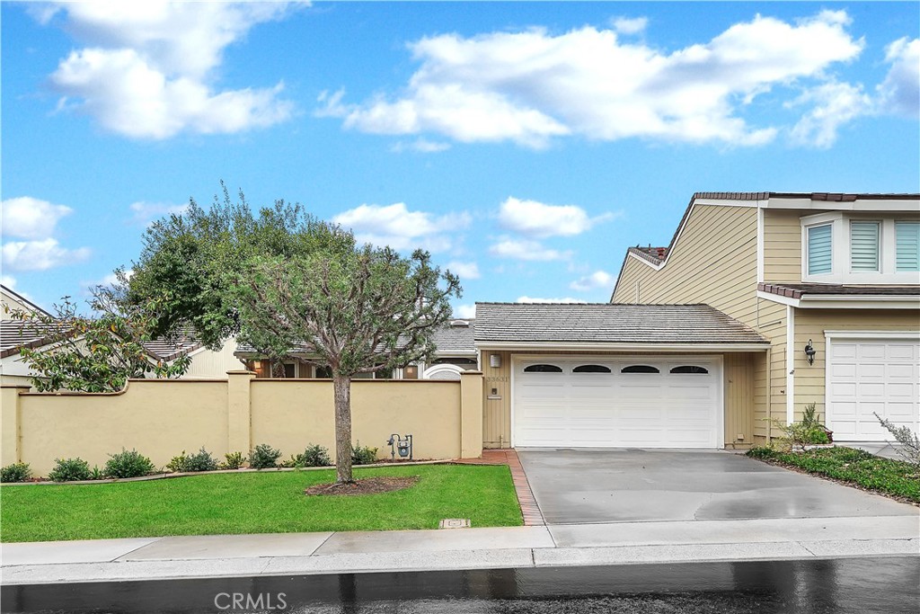 33631 Marlinspike Drive Dana Point, CA 92629 - Photo 28 of 39 a white house with a yard and garage