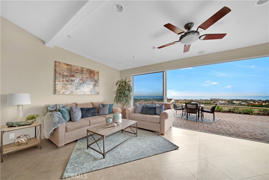 33631 Marlinspike Drive Dana Point, CA 92629 - Photo 3 of 39 a living room with furniture and a ceiling fan