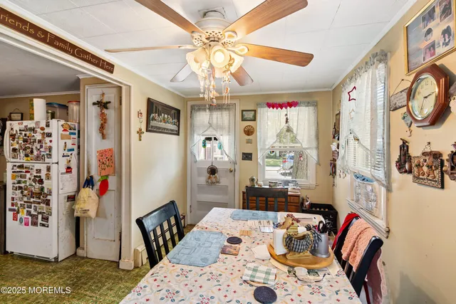 a bedroom with furniture and a chandelier