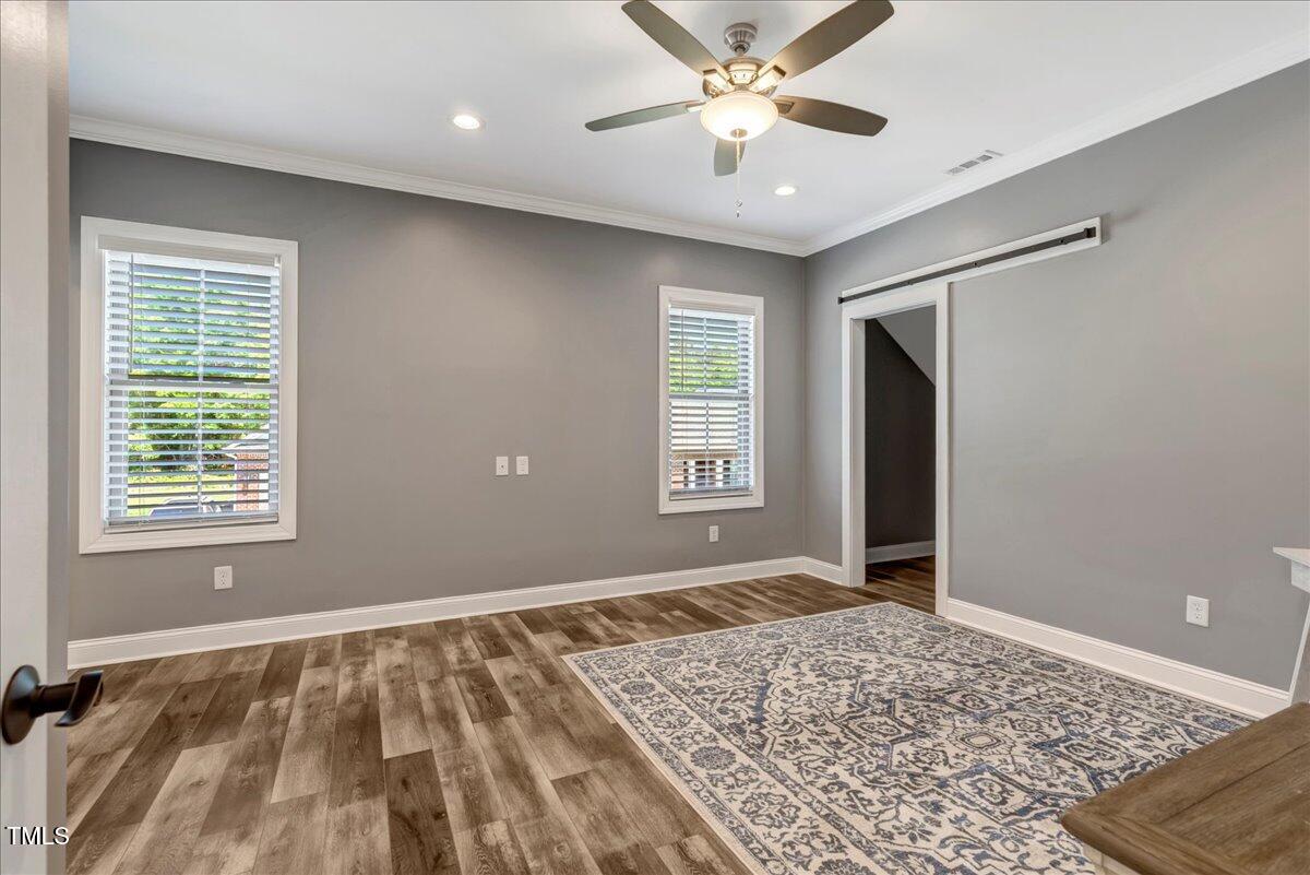 2258 Sanders Road Stem, NC 27581 - Photo 17 of 42 a view of an empty room and window