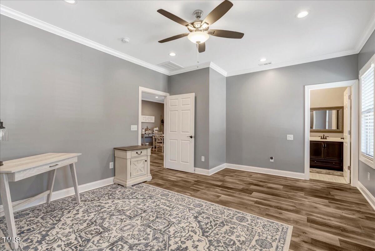 2258 Sanders Road Stem, NC 27581 - Photo 18 of 42 a view of a livingroom with a workspace