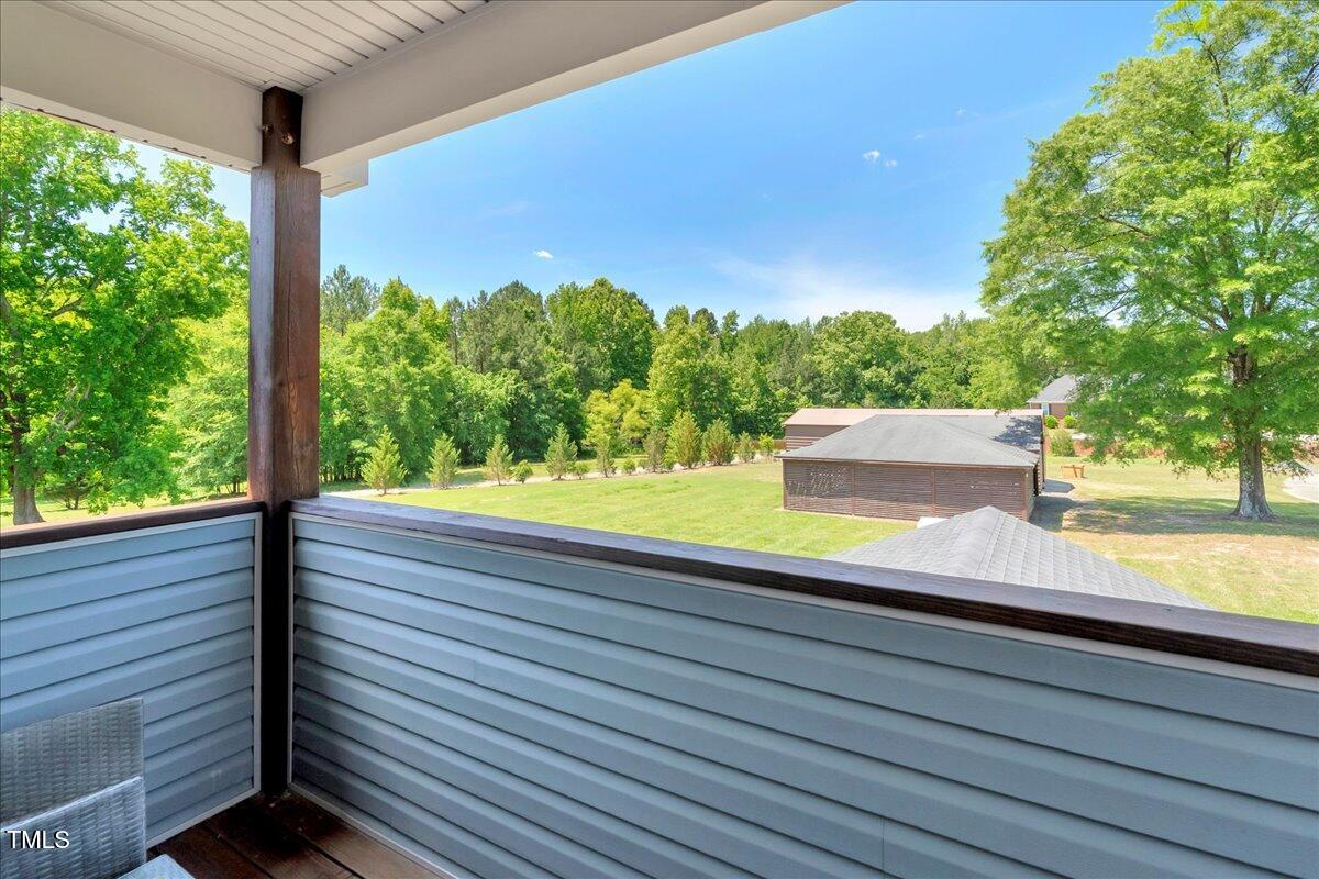 2258 Sanders Road Stem, NC 27581 - Photo 23 of 42 a view of a bench in the window