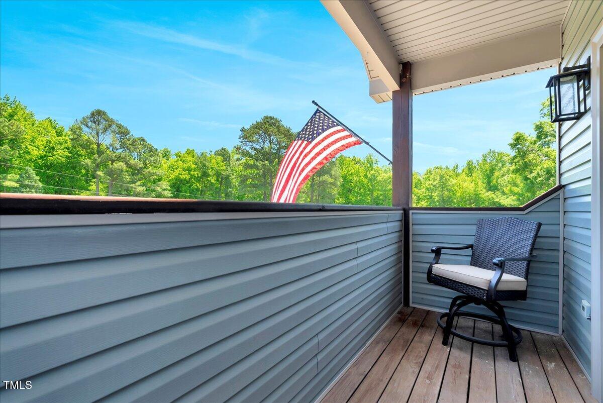 2258 Sanders Road Stem, NC 27581 - Photo 24 of 42 a view of a two chairs in the balcony