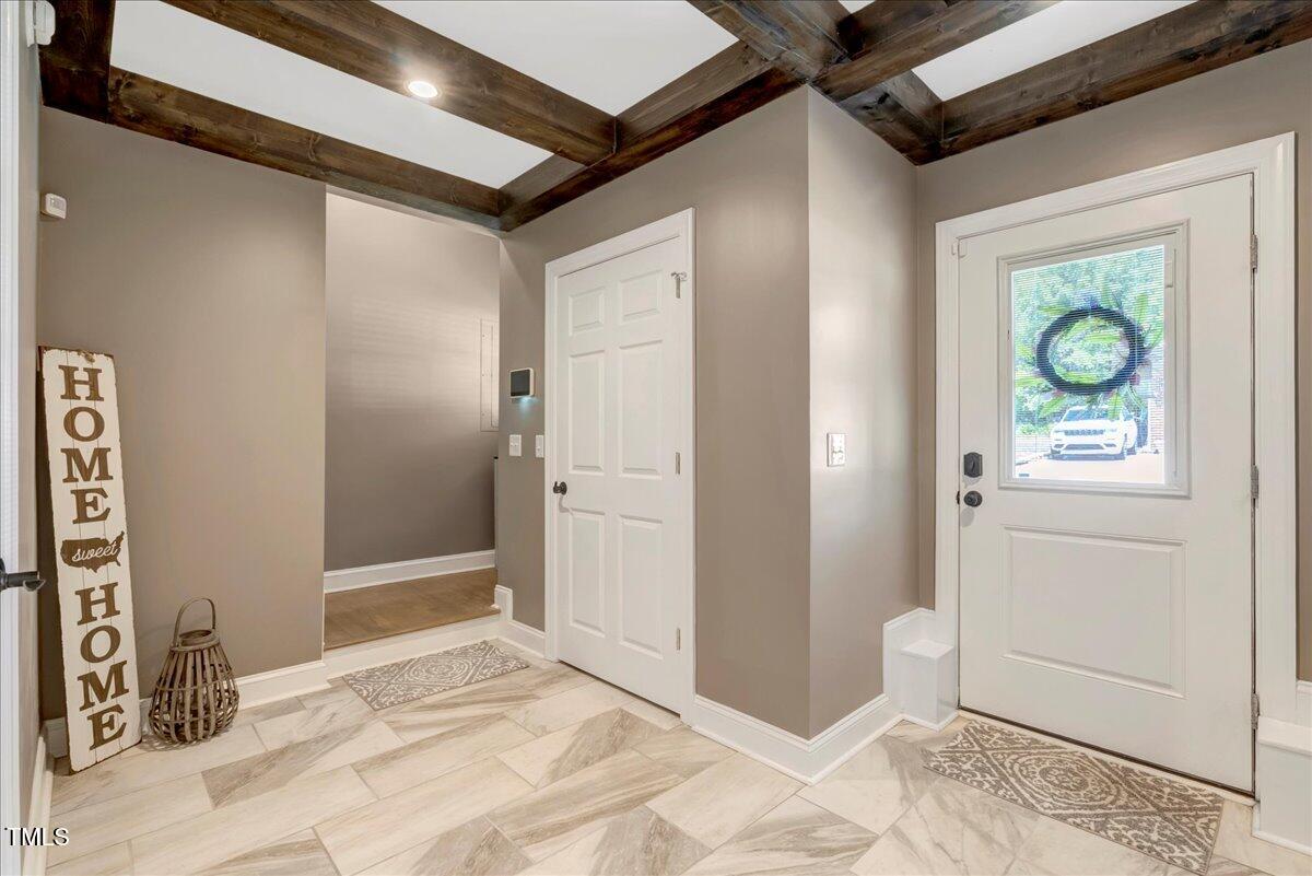 2258 Sanders Road Stem, NC 27581 - Photo 31 of 42 a view of a hallway to a bedroom
