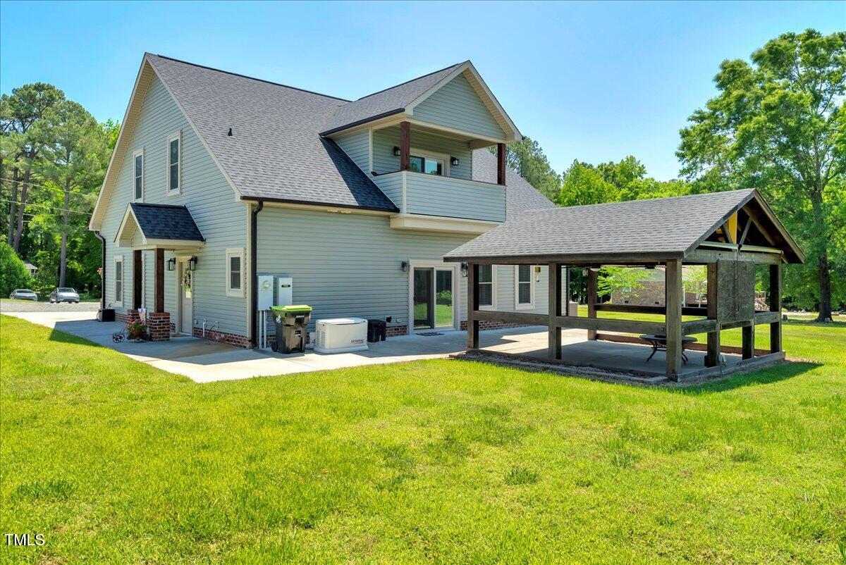 2258 Sanders Road Stem, NC 27581 - Photo 36 of 42 a view of a house with swimming pool and sitting area