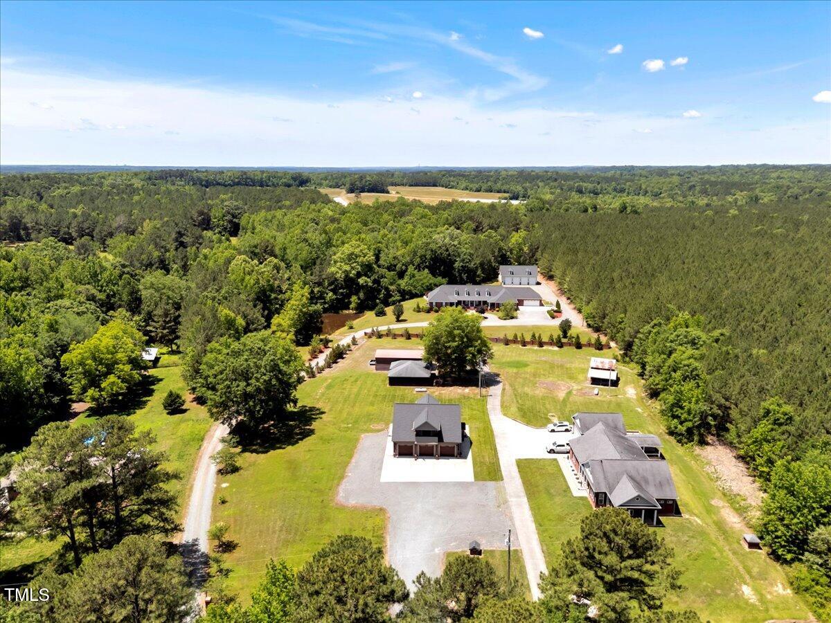 2258 Sanders Road Stem, NC 27581 - Photo 38 of 42 an aerial view of a house with a garden
