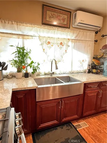 a view of kitchen with wooden floor