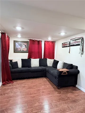 a living room with furniture and a couch