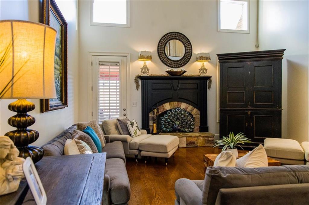 280 Ravenwood Drive Southeast Rome, GA 30161 - Photo 26 of 56 a living room with furniture and a fireplace