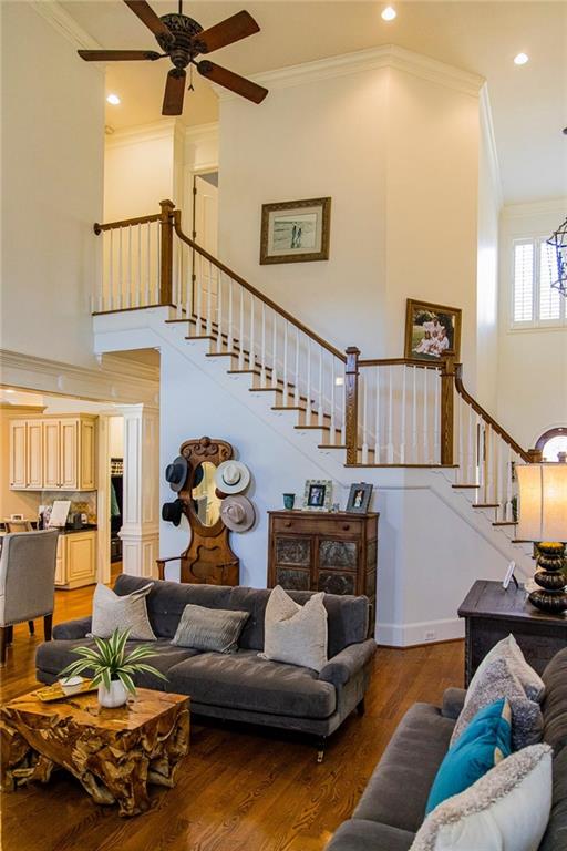 280 Ravenwood Drive Southeast Rome, GA 30161 - Photo 27 of 56 a living room with furniture and a chandelier