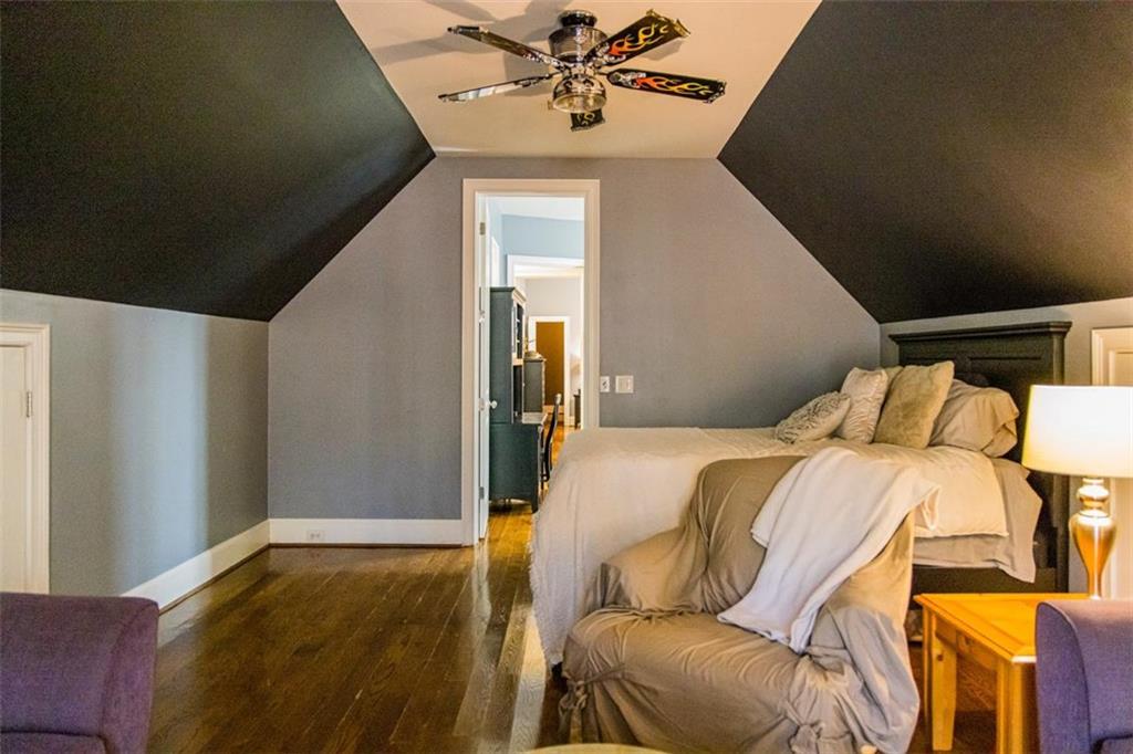 280 Ravenwood Drive Southeast Rome, GA 30161 - Photo 48 of 56 a bedroom with a bed and ceiling fan