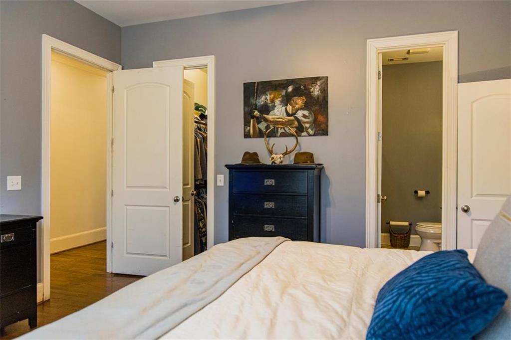 280 Ravenwood Drive Southeast Rome, GA 30161 - Photo 50 of 56 a bedroom with a bed and a dresser