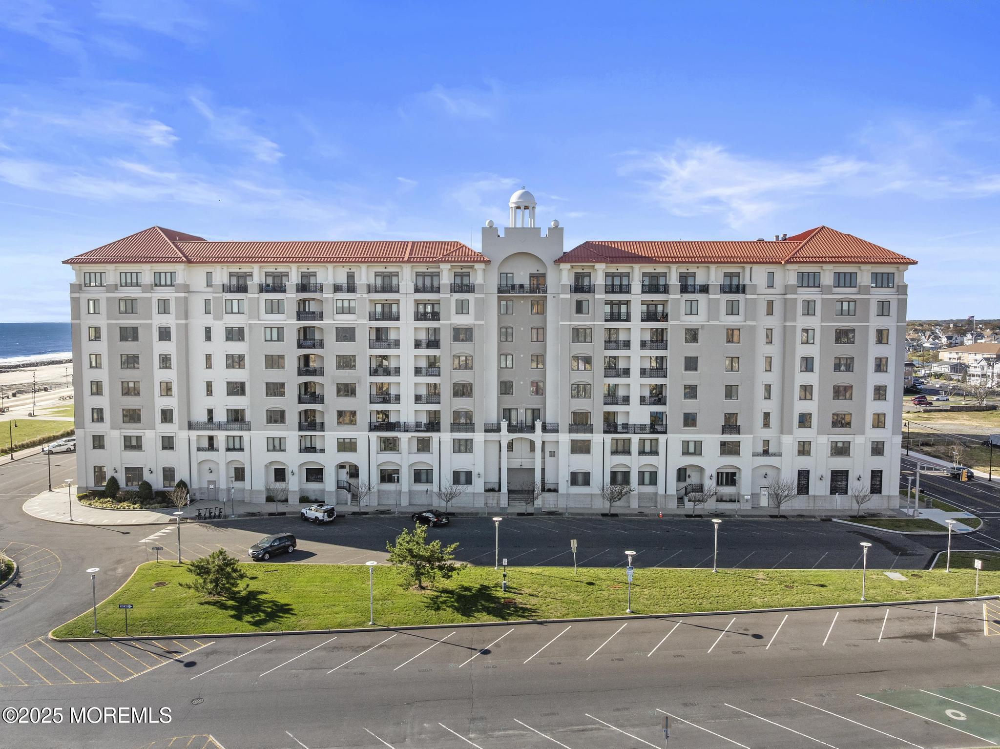 1501 Ocean Avenue, Unit 2112 Asbury Park, NJ 07712 - Photo 4 of 43 a view of building with lot of windows