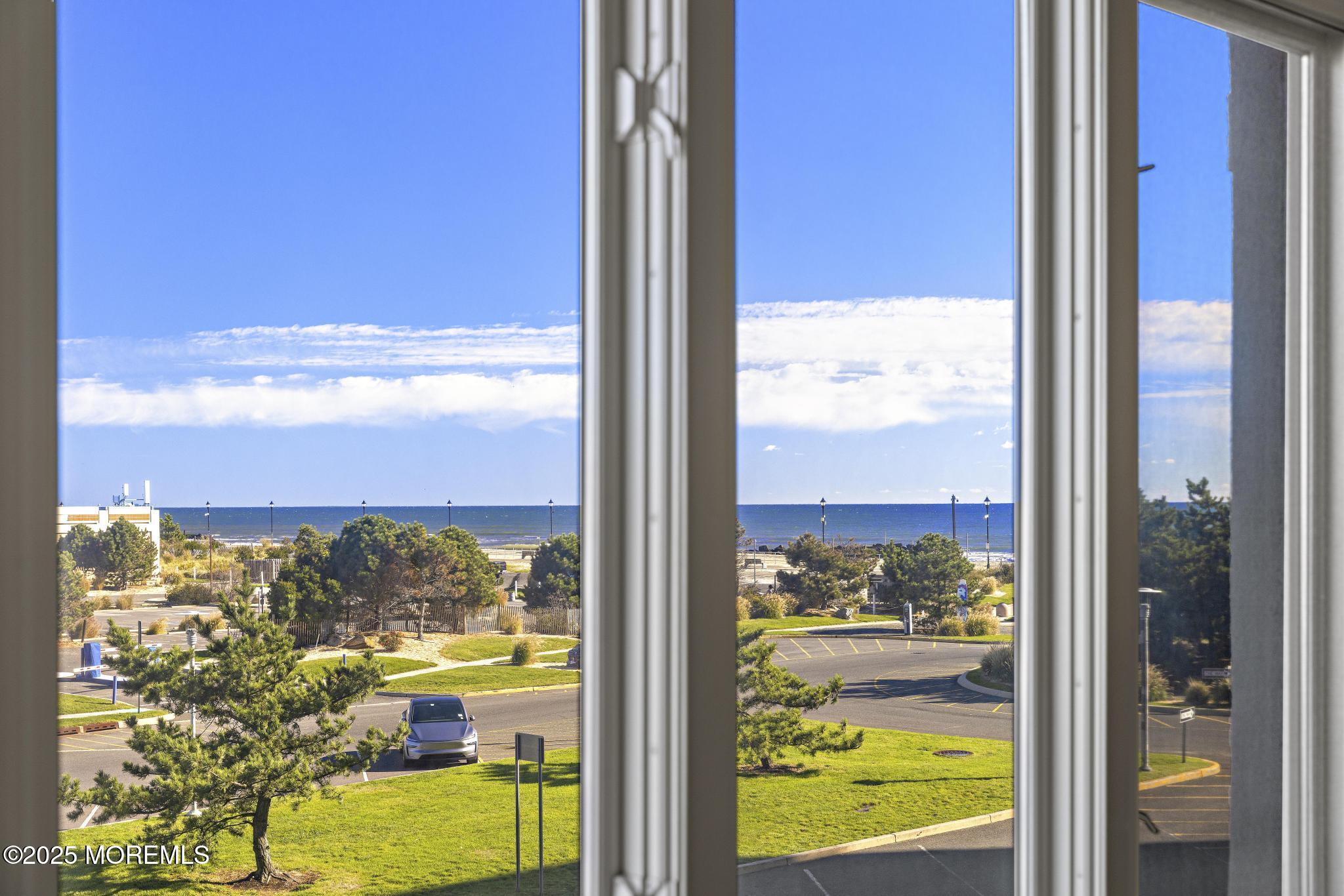 1501 Ocean Avenue, Unit 2112 Asbury Park, NJ 07712 - Photo 6 of 43 a view of a glass building from a window