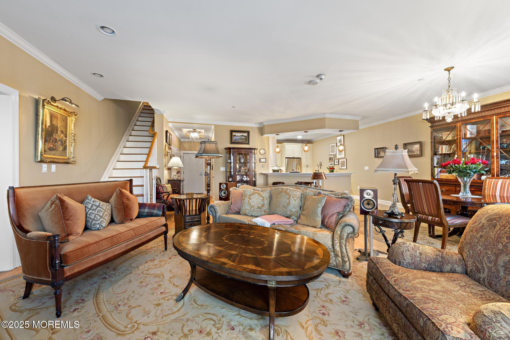 1501 Ocean Avenue, Unit 2112 Asbury Park, NJ 07712 - Photo 9 of 43 a living room with furniture and a chandelier