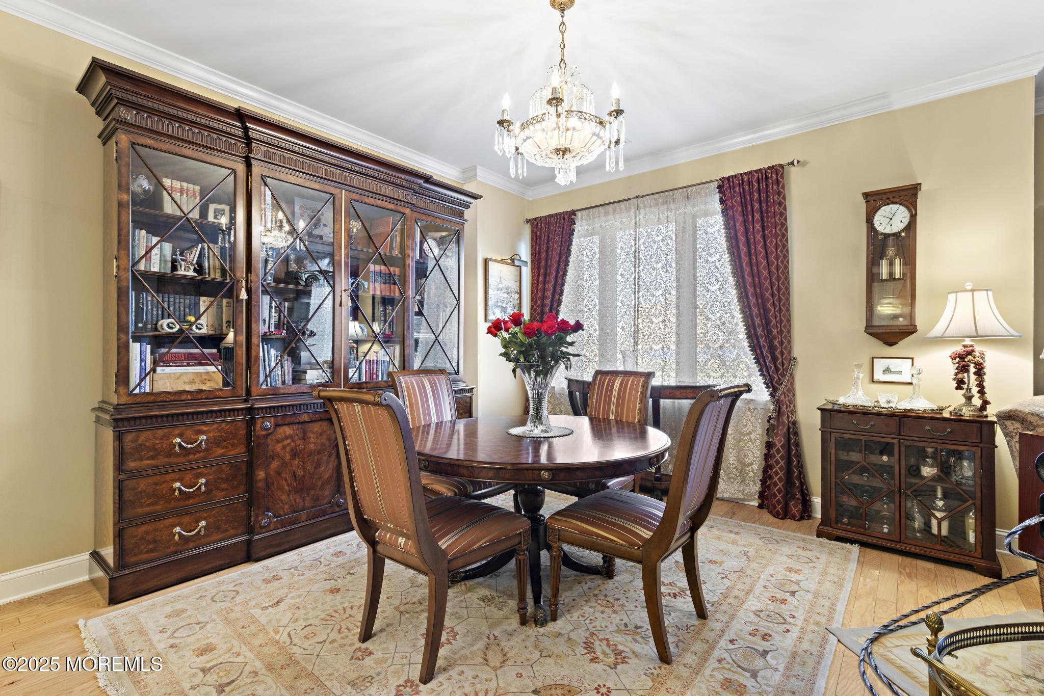 1501 Ocean Avenue, Unit 2112 Asbury Park, NJ 07712 - Photo 10 of 43 a view of a dining room with furniture and window