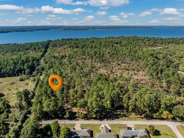 a view of a back yard of the house and swimming pool