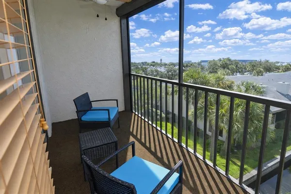 a bathroom with a toilet sink vanity and mirror