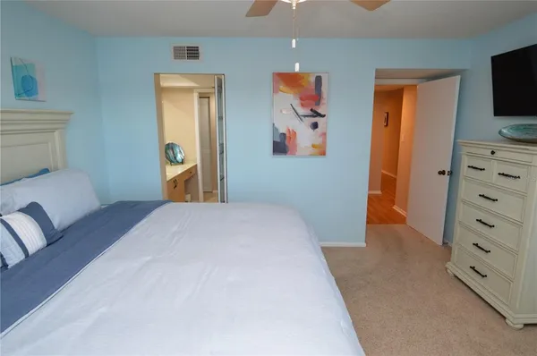 a kitchen with lots of counter top space and appliances