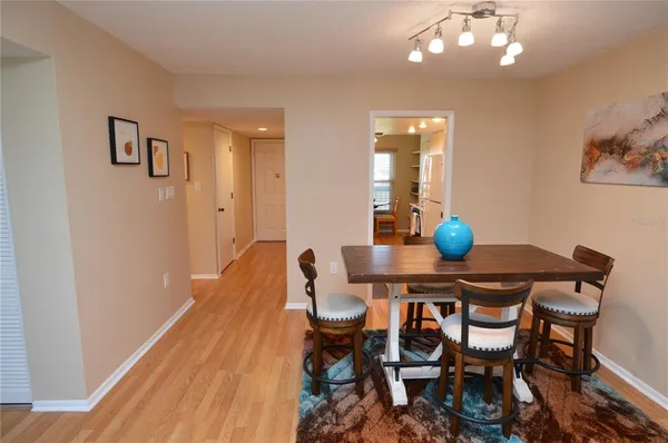 a living room with furniture and a table