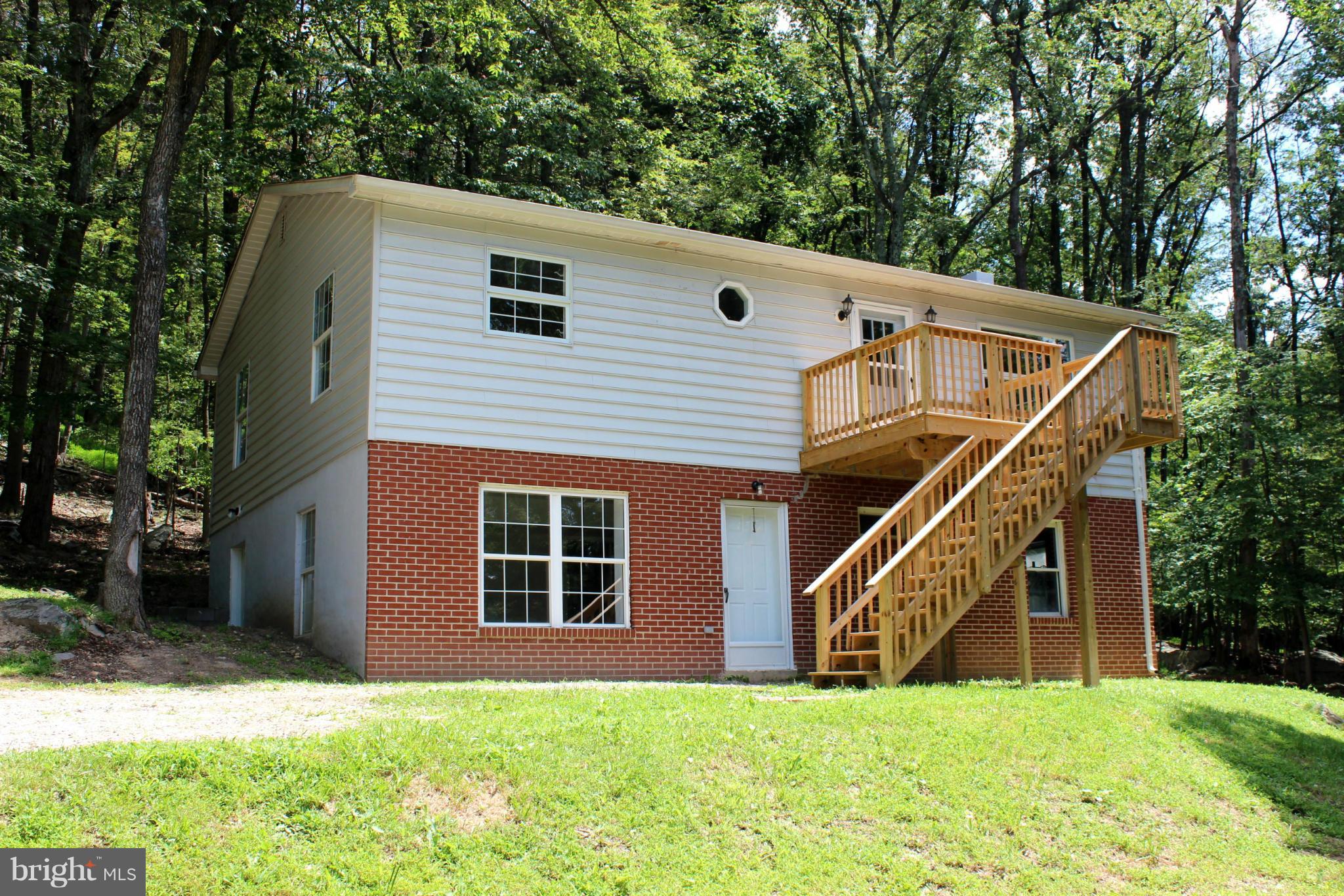 Rancher with Part Brick Front