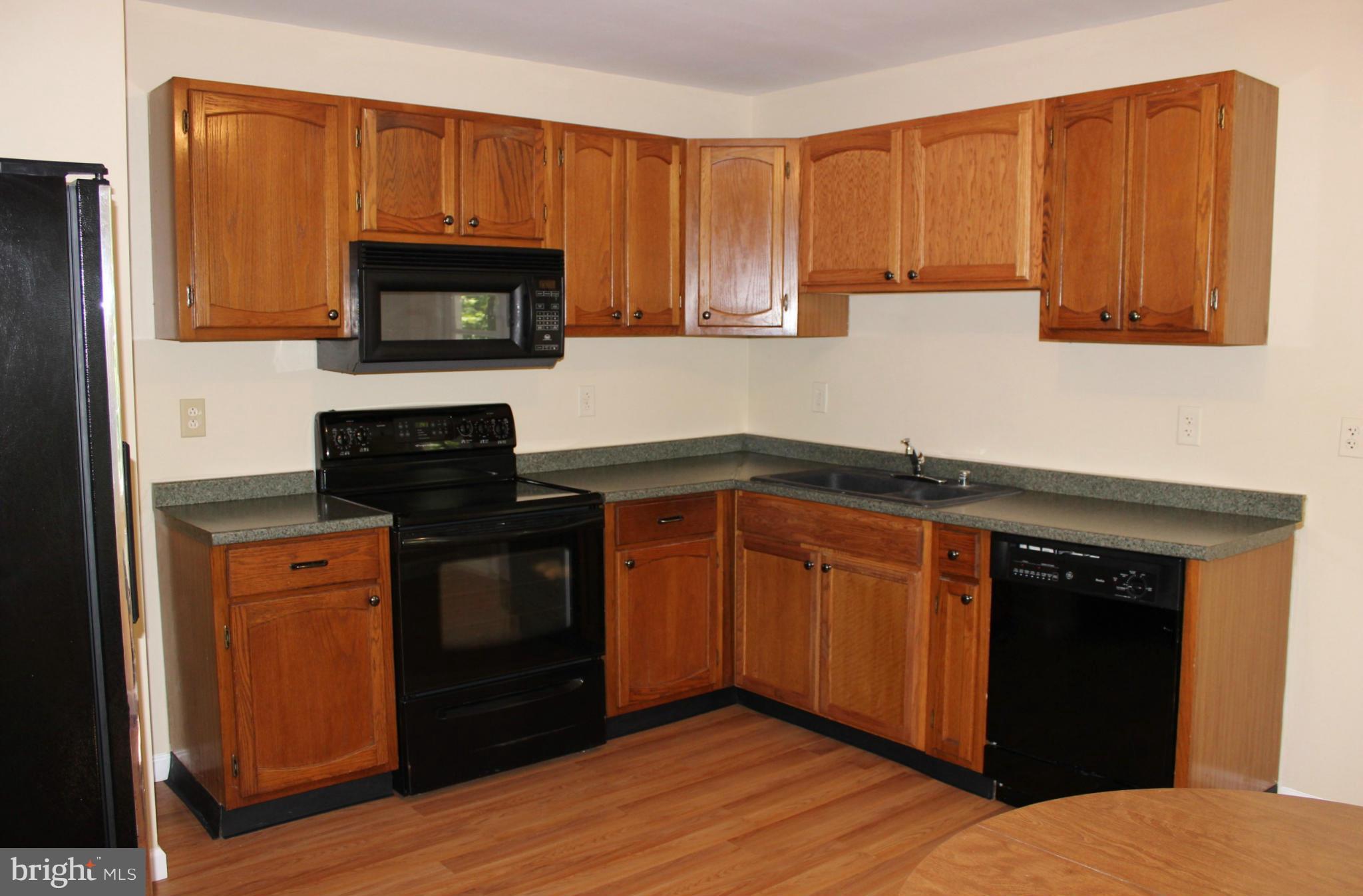 376 Highview Road Harpers Ferry, WV 25425 - Photo 9 of 22 Kitchen with Laminate Flooring