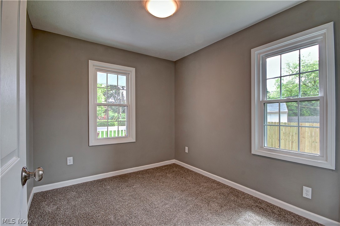14507 Glencliffe Road Cleveland, OH 44111 - Photo 22 of 31 View of carpeted spare room