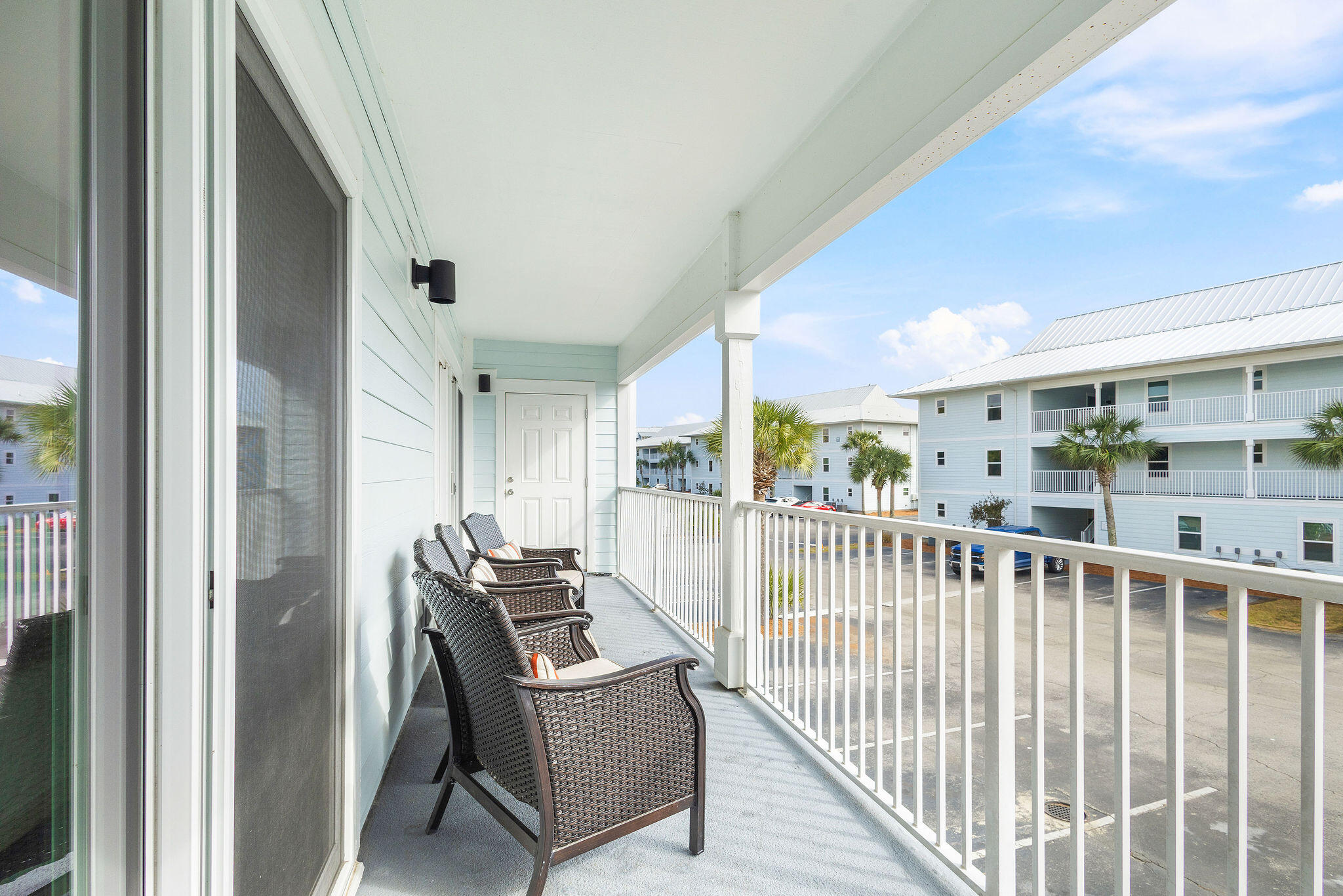 11 Beachside Drive, Unit 922 Santa Rosa Beach, FL 32459 - Photo 18 of 42 a view of a balcony with chair and front door