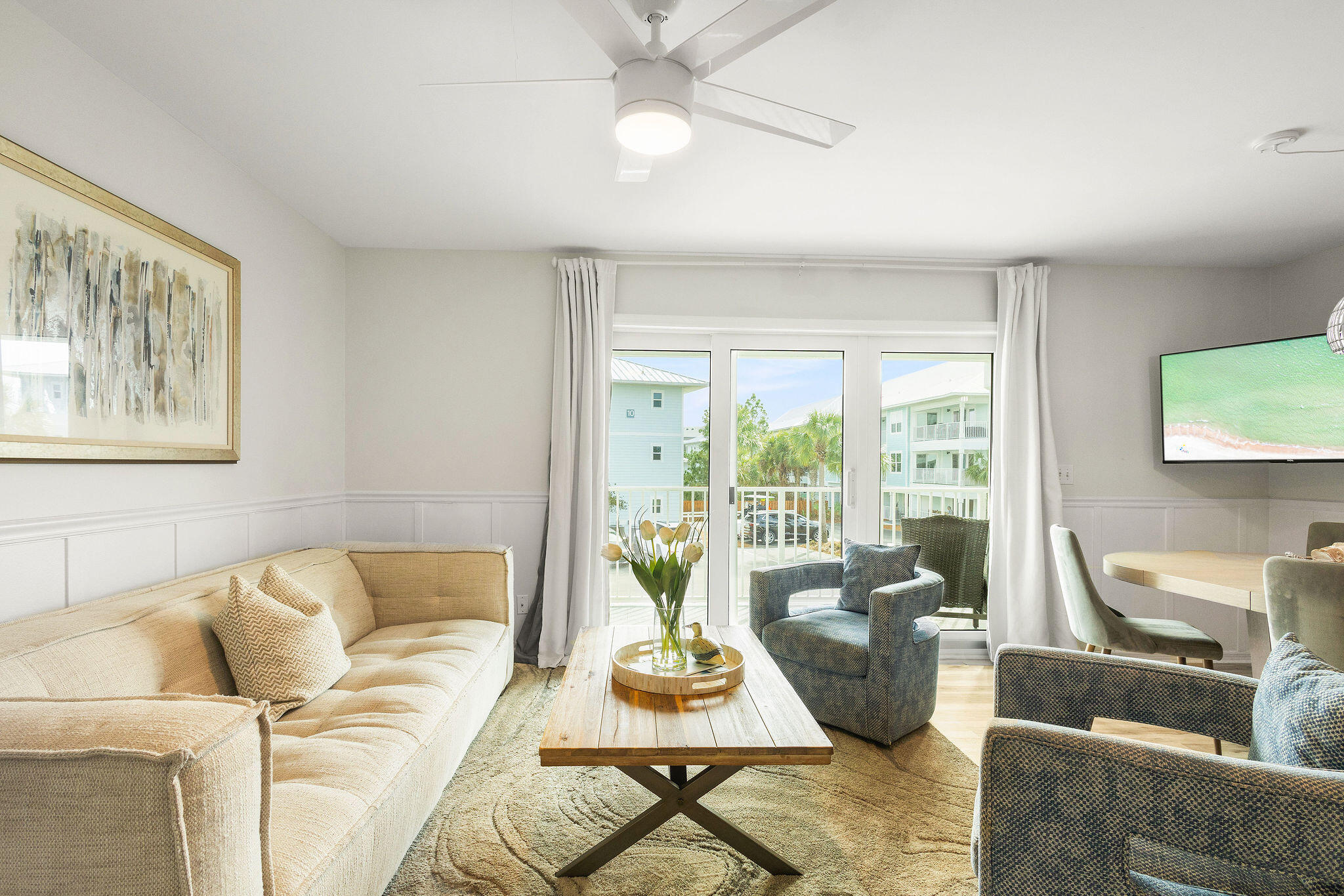 11 Beachside Drive, Unit 922 Santa Rosa Beach, FL 32459 - Photo 2 of 42 a living room with furniture and a large window