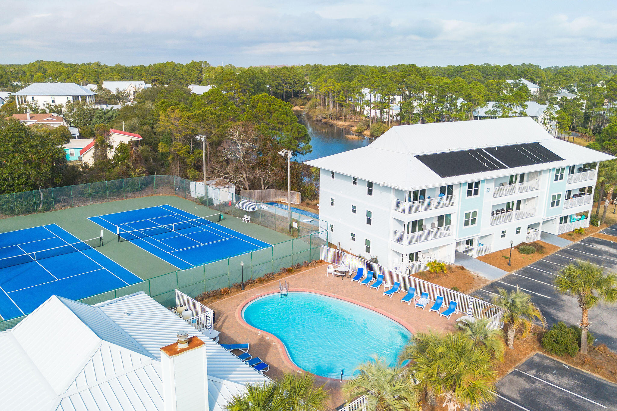 11 Beachside Drive, Unit 922 Santa Rosa Beach, FL 32459 - Photo 27 of 42 an aerial view of residential houses with outdoor space and river