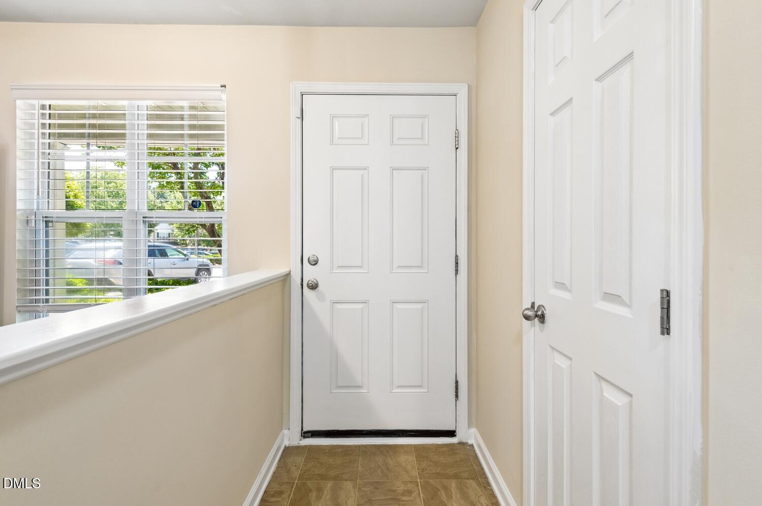 3635 Bison Hill Lane Raleigh, NC 27604 - Photo 3 of 18 a view of front door with wooden floor