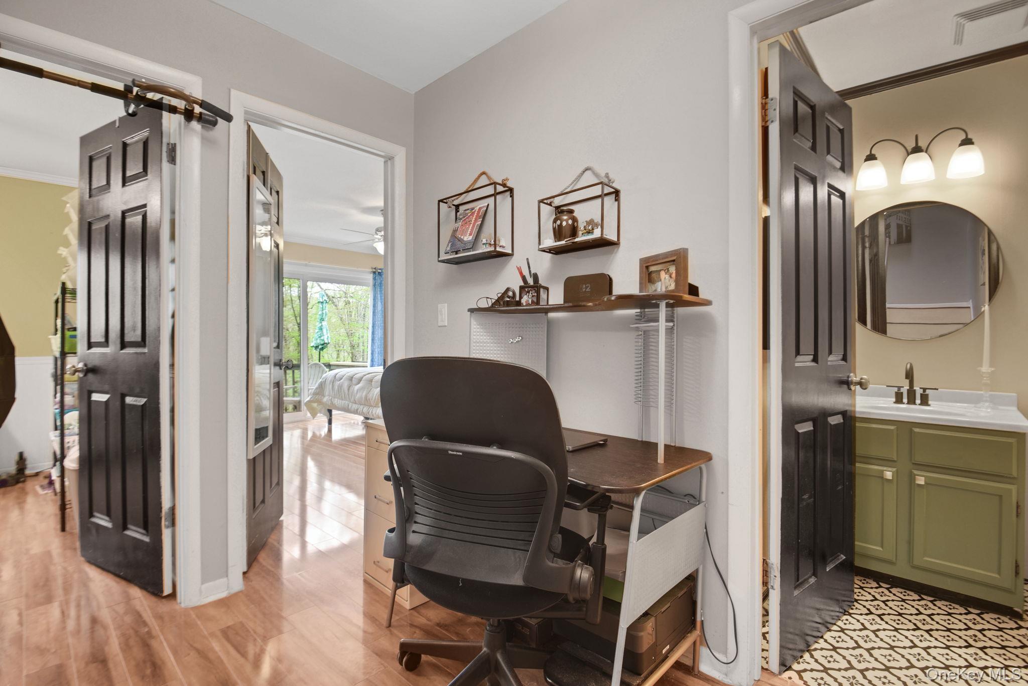 805 Eagles Ridge Road Brewster, NY 10509 - Photo 12 of 22 a workspace with furniture and chandelier