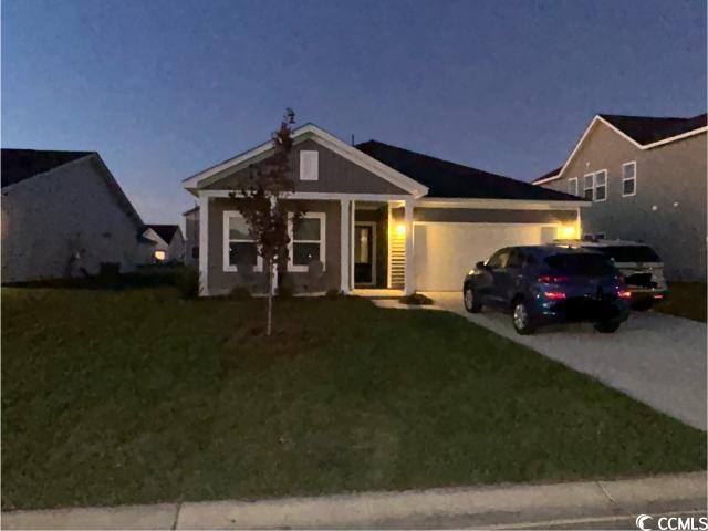 277 Valerio Street Myrtle Beach, SC 29579 - Photo 1 of 6 View of front of property featuring a front lawn a