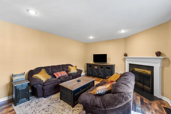 a bedroom with a bed and a television